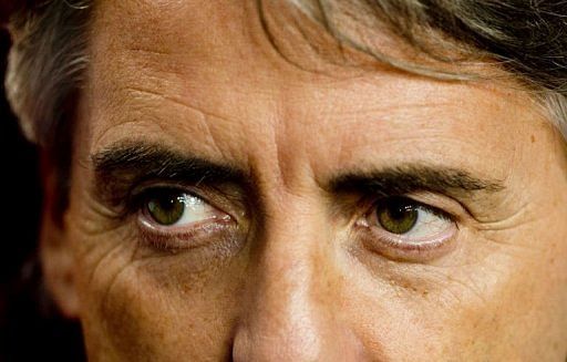Roberto Mancini rebuffed suggestions that his tactical tinkering had cost City the match